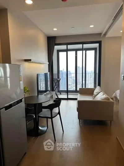 Modern living room with city view and balcony access