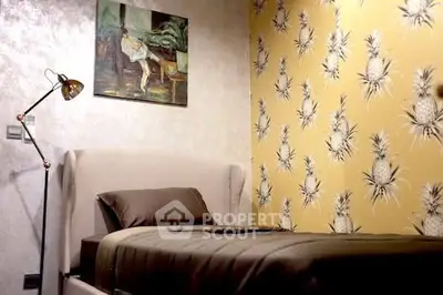 Stylish bedroom with unique pineapple wallpaper and modern decor