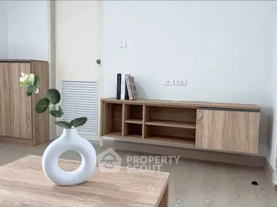 Modern minimalist living room with wooden furniture and stylish decor