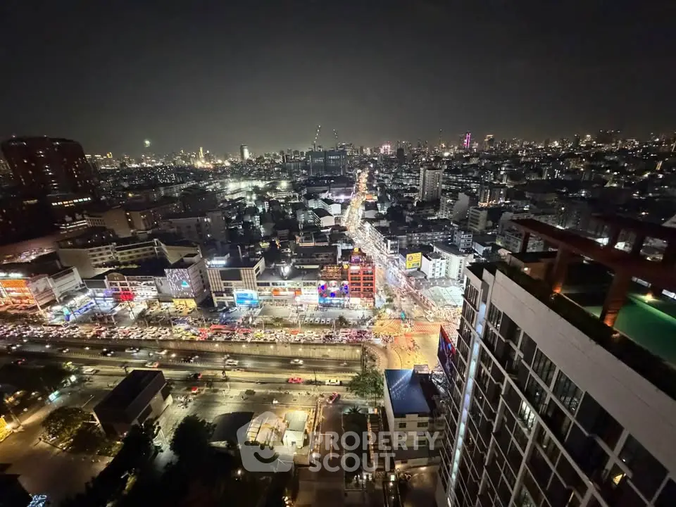 Stunning cityscape night view from high-rise building balcony