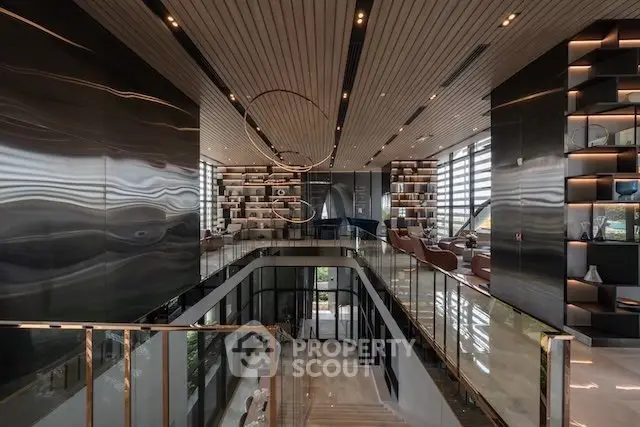 Luxurious modern interior with sleek design and expansive windows offering stunning views.