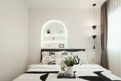 Modern bedroom with stylish decor and cozy ambiance