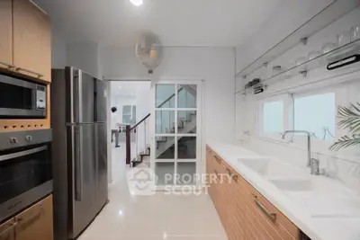 Modern kitchen with sleek appliances and ample counter space