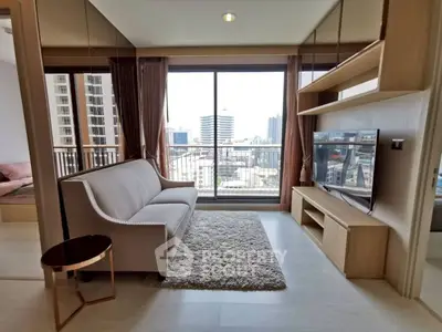 Modern living room with city view, cozy sofa, and sleek entertainment unit.