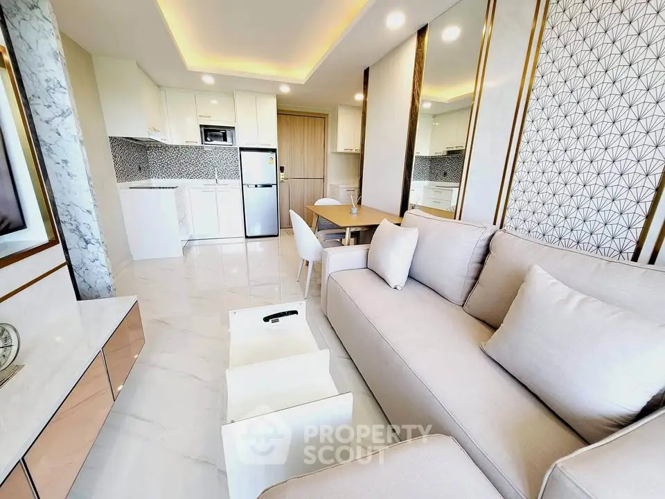 Luxurious modern living room with elegant decor and open kitchen layout
