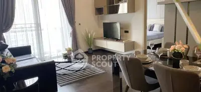 Modern living room with elegant dining area and stylish decor