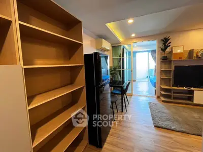 Modern living room with open layout and stylish wooden shelves