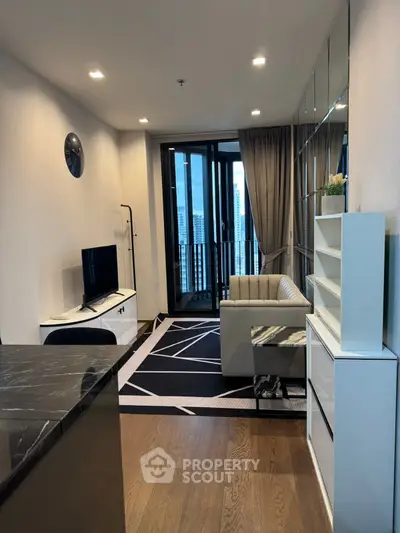 Modern living room with city view, sleek furniture, and stylish decor