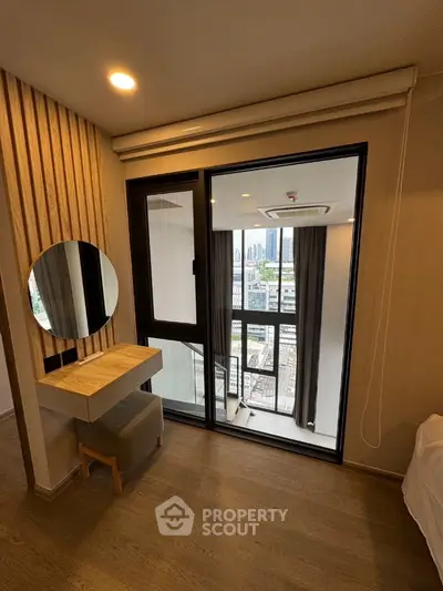 Modern bedroom with city view balcony and stylish wooden decor