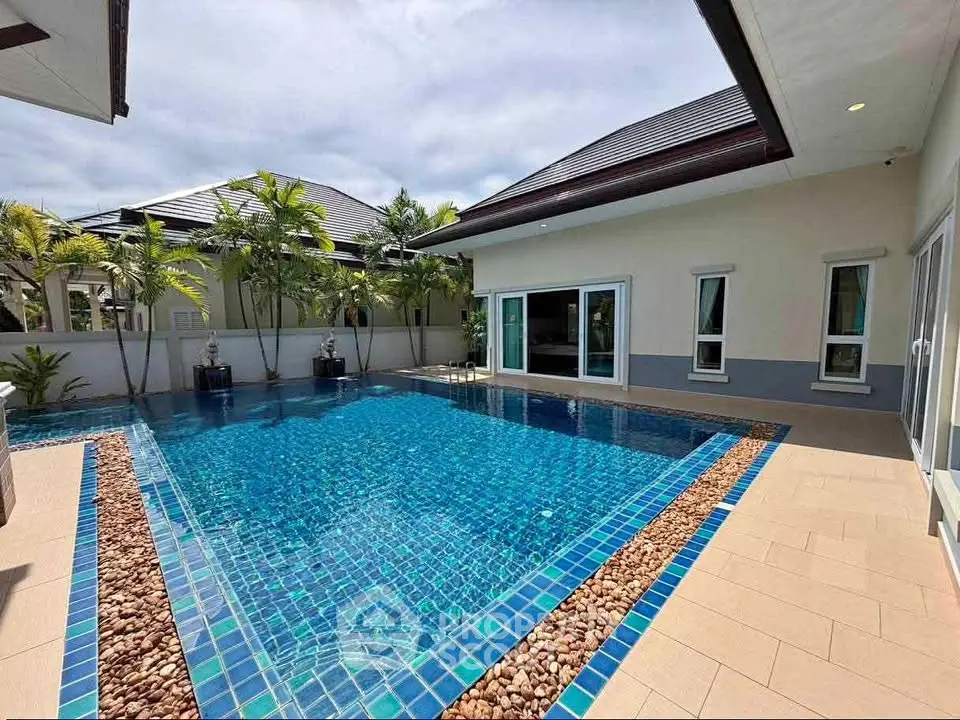 Luxurious private villa with sparkling pool and modern architecture