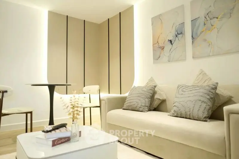 Elegant modern living room with stylish decor and cozy seating area, perfect for relaxation and entertaining.