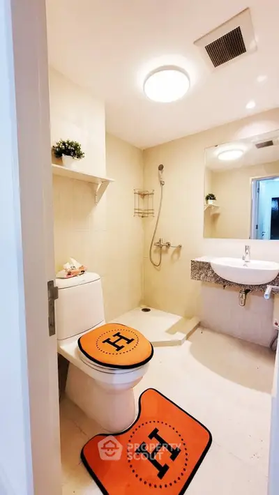 Modern bathroom with sleek fixtures and stylish decor in a contemporary home.