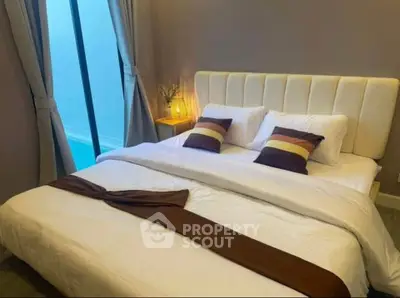 Cozy bedroom with elegant decor and natural light