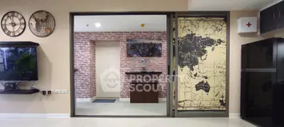 Stylish modern living room with brick accent wall and world map decor