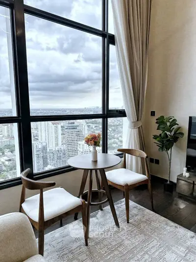 Luxurious high-rise living room with stunning city view and elegant decor