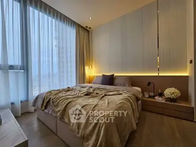 Luxurious modern bedroom with floor-to-ceiling windows and elegant lighting