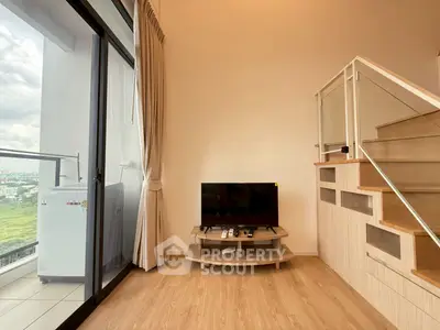 Modern living room with balcony view and stylish staircase