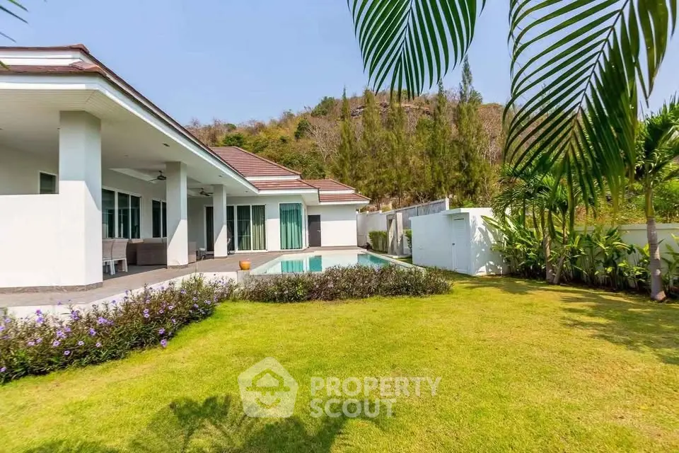 Luxurious villa with private pool and lush garden, perfect for serene living.