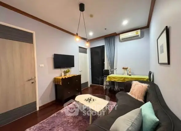 Cozy living room with modern decor and air conditioning