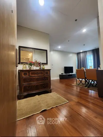 Elegant living room with wooden flooring and modern decor