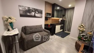 Modern compact living room with integrated kitchen and stylish decor