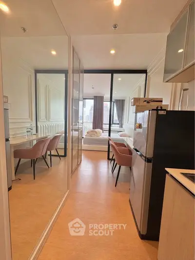 Modern studio apartment with stylish interior and city view