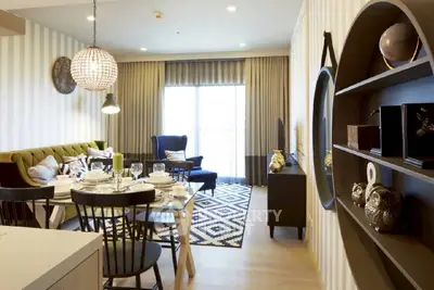 Stylish modern living room with elegant decor and dining area