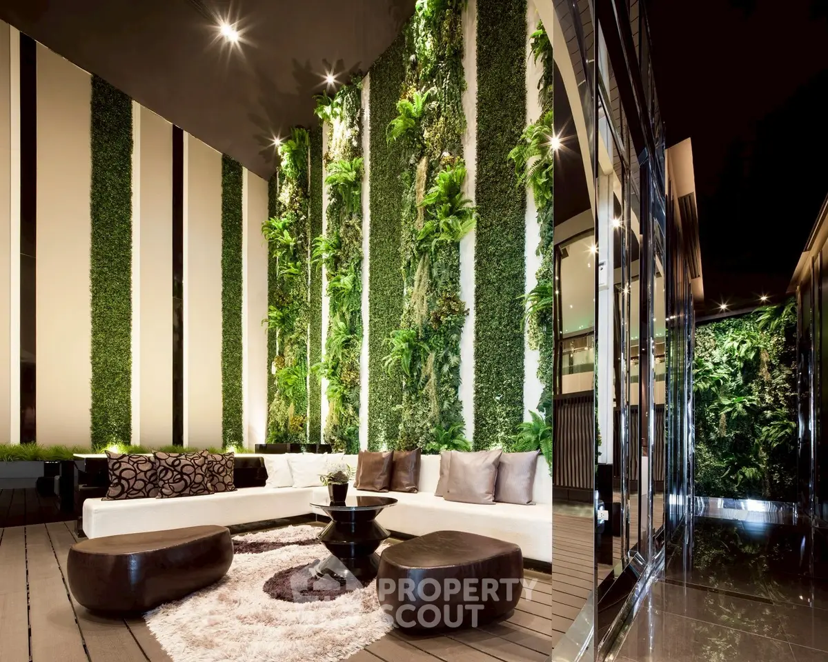 Luxurious modern living room with vertical garden and elegant seating area