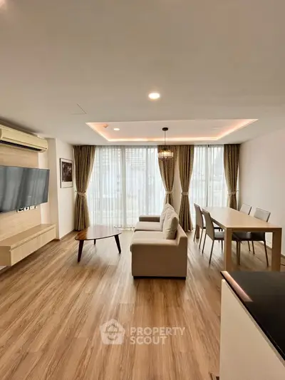 Spacious modern living room with elegant decor and natural light