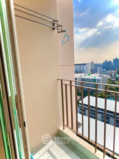 Charming balcony with city view, perfect for relaxation and enjoying urban scenery.