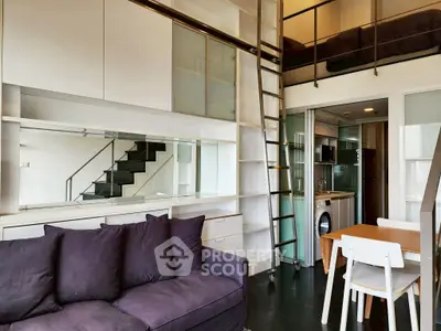 Modern loft apartment with stylish interior and compact kitchen