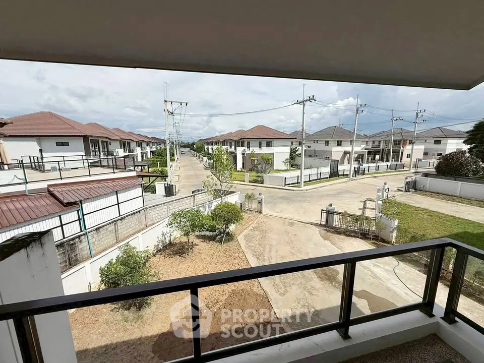 Scenic view from balcony overlooking modern residential neighborhood