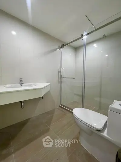 Modern bathroom with sleek shower enclosure and minimalist design
