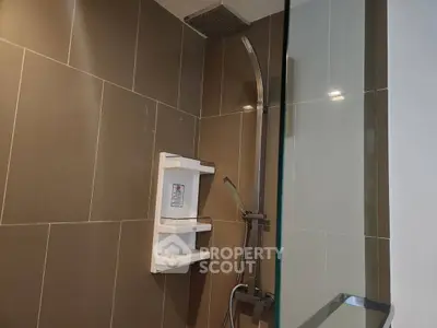 Modern bathroom with sleek shower design and elegant tile work