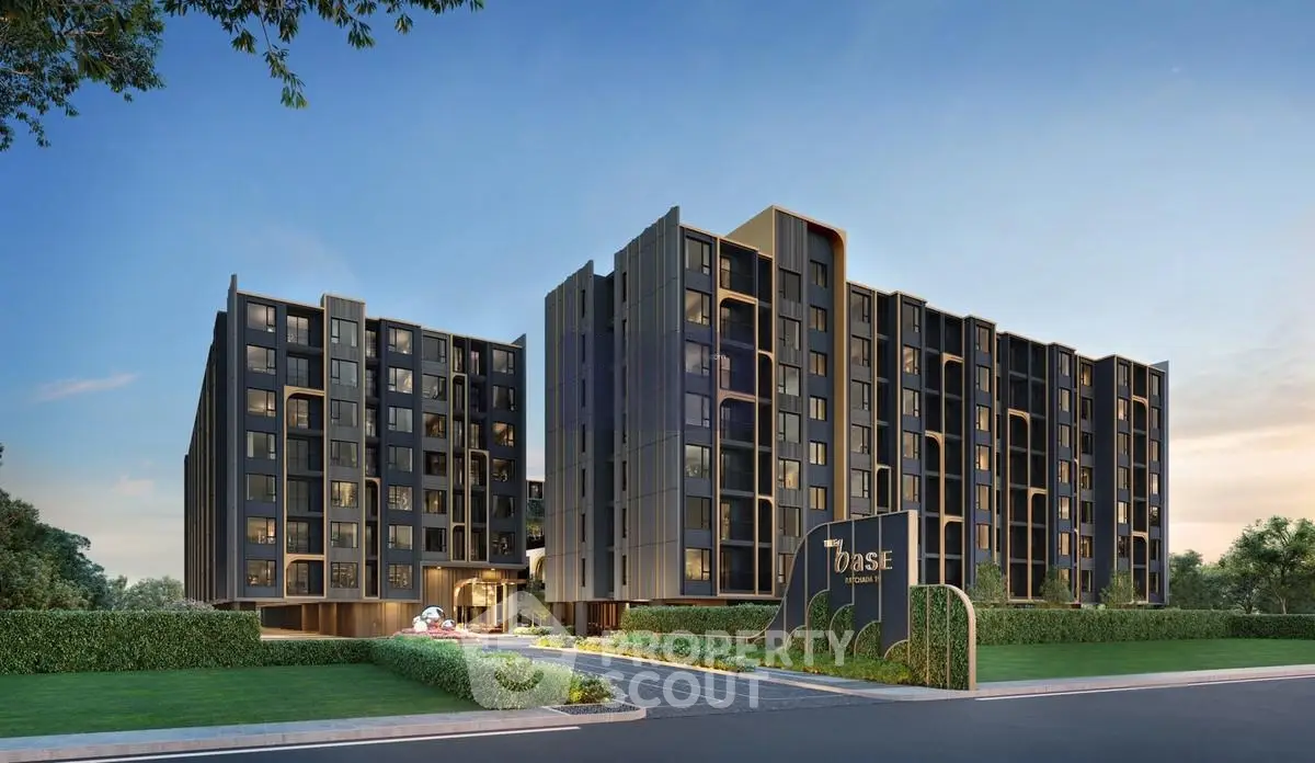 Modern apartment building with sleek design and lush landscaping, ideal for urban living.