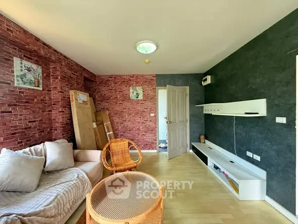 Charming living room with modern decor and cozy seating area.