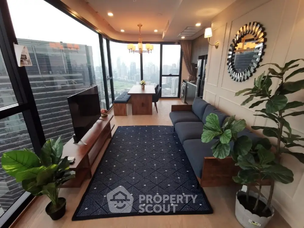 Luxurious corner unit living room with panoramic city views and modern furnishings.