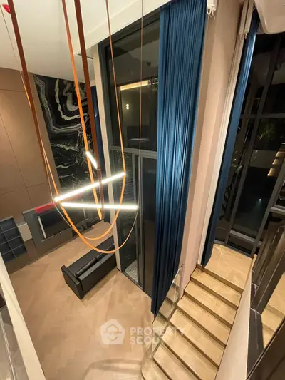 Luxurious modern living room with high ceilings and elegant lighting