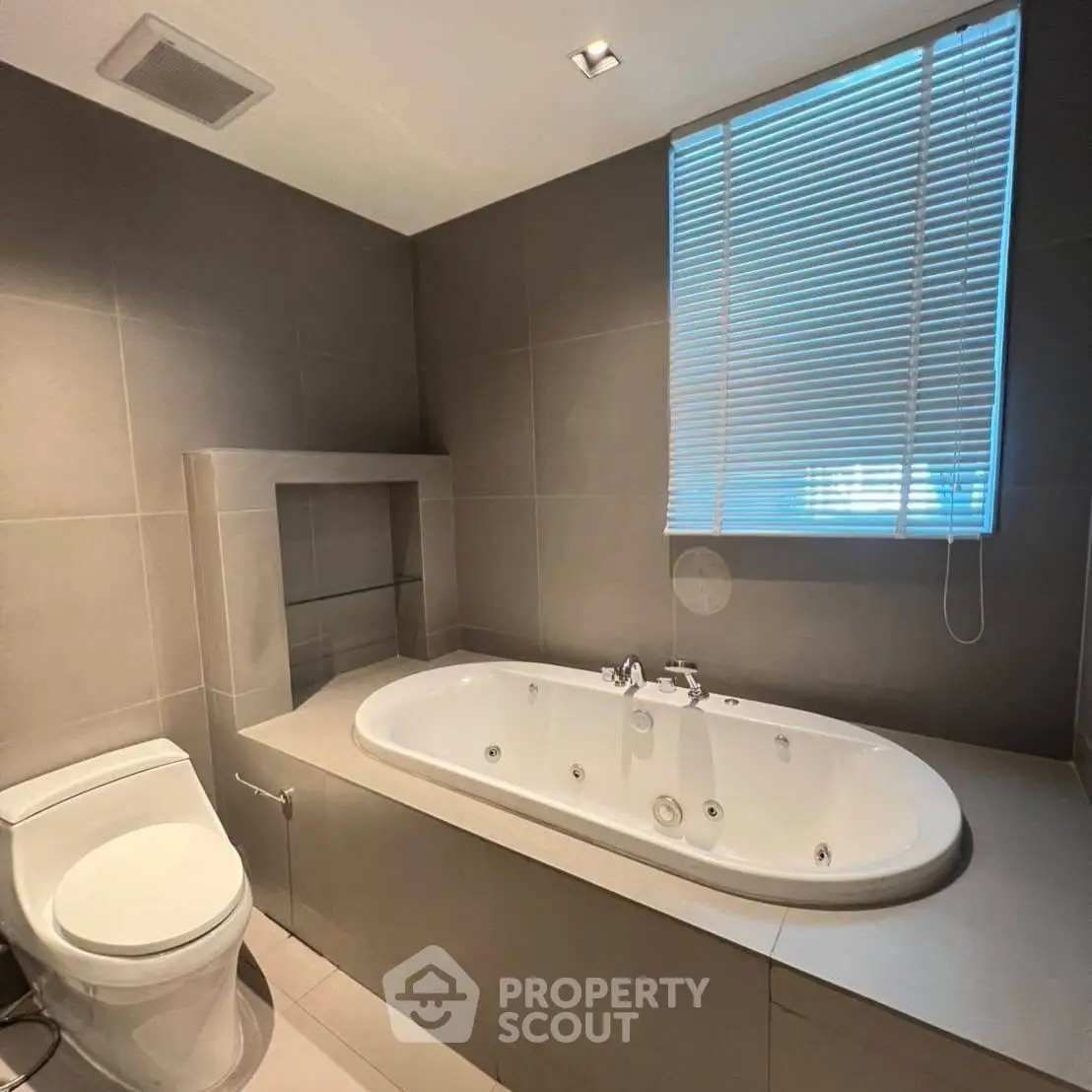 Modern bathroom with sleek bathtub and contemporary design