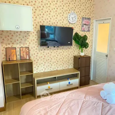 Charming bedroom with floral wallpaper and modern decor