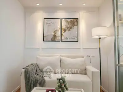 Chic living room with modern decor and cozy seating, perfect for relaxation and entertaining.