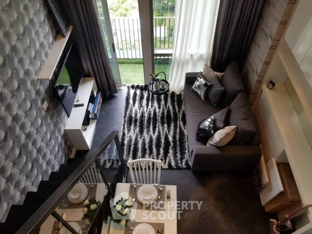 Stylish modern living room with balcony view and chic decor