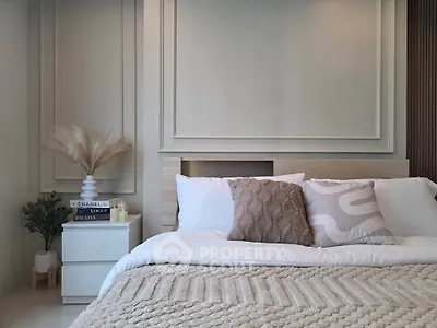 Elegant bedroom with cozy bedding and stylish decor