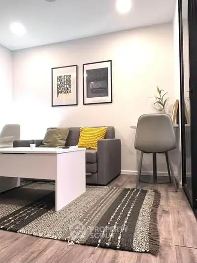 Modern living room with stylish decor and cozy seating area.