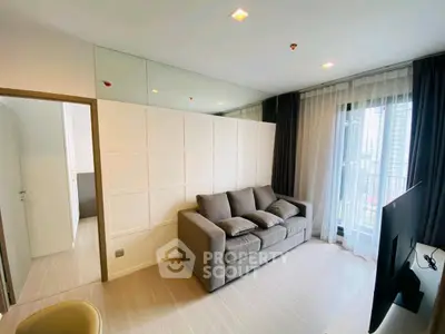 Modern living room with cozy sofa and large window view