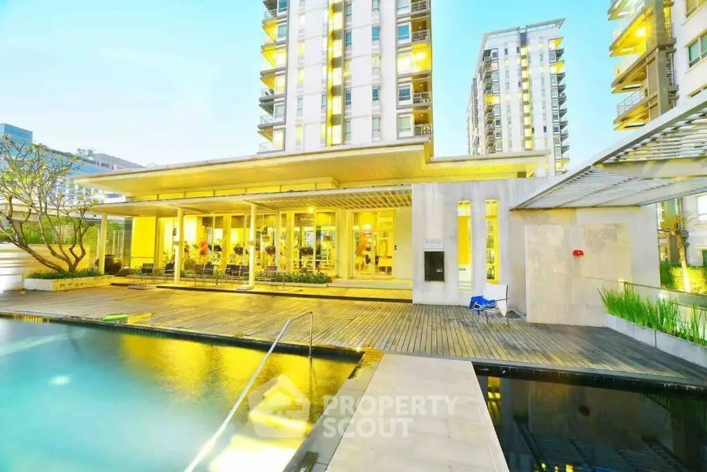 Luxurious apartment complex with modern pool and gym facilities