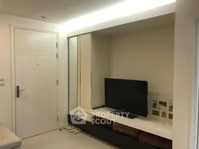 Modern living room with sleek TV unit and cozy decor
