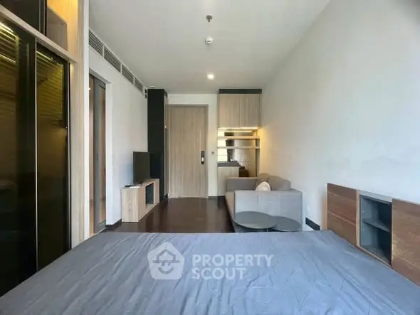 Modern studio apartment with sleek design and cozy living area