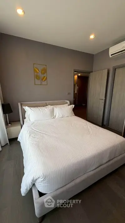 Modern bedroom with stylish decor and cozy ambiance