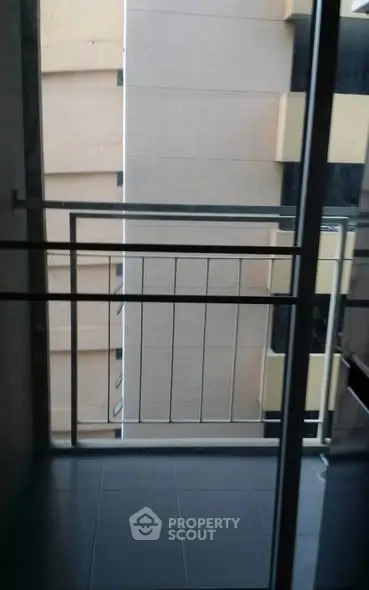 Modern balcony with sleek railing and city view